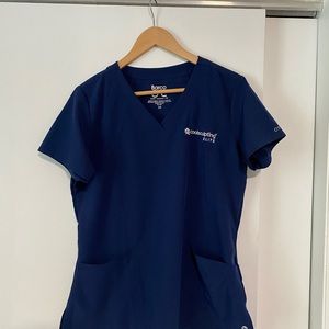Women’s scrubs by BarCo.